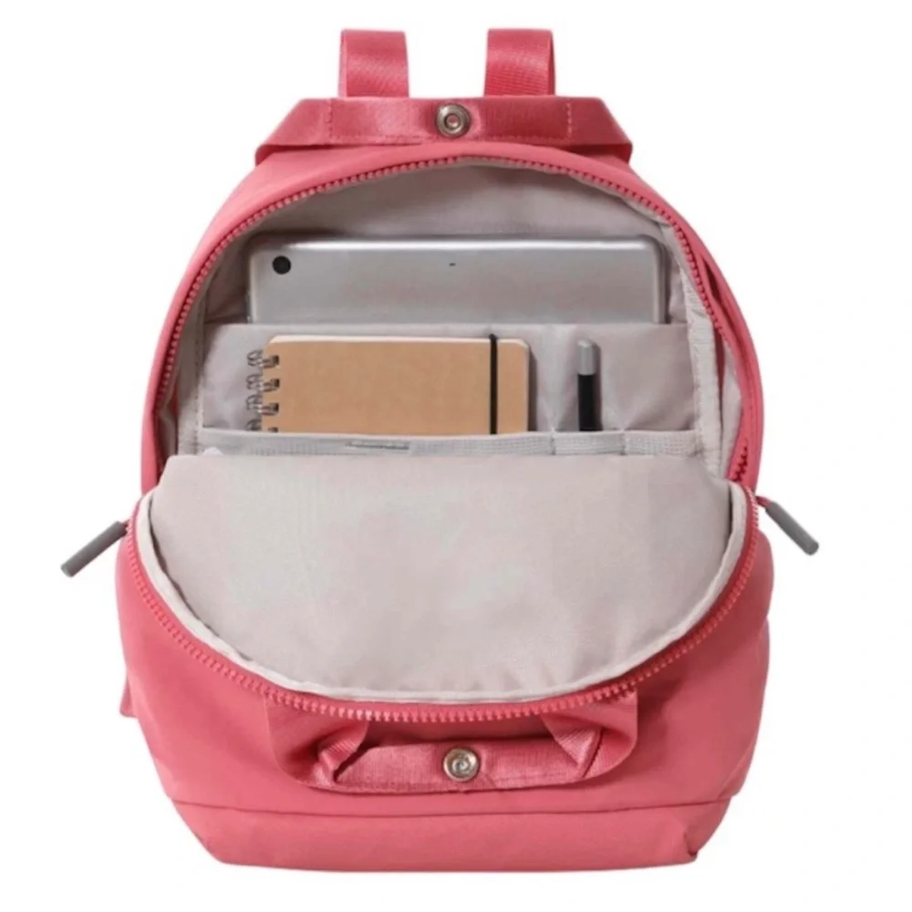 The North Face Women’s Never Stop Mini 7 Liter Backpack In Slate Rose - Picture 9 of 10